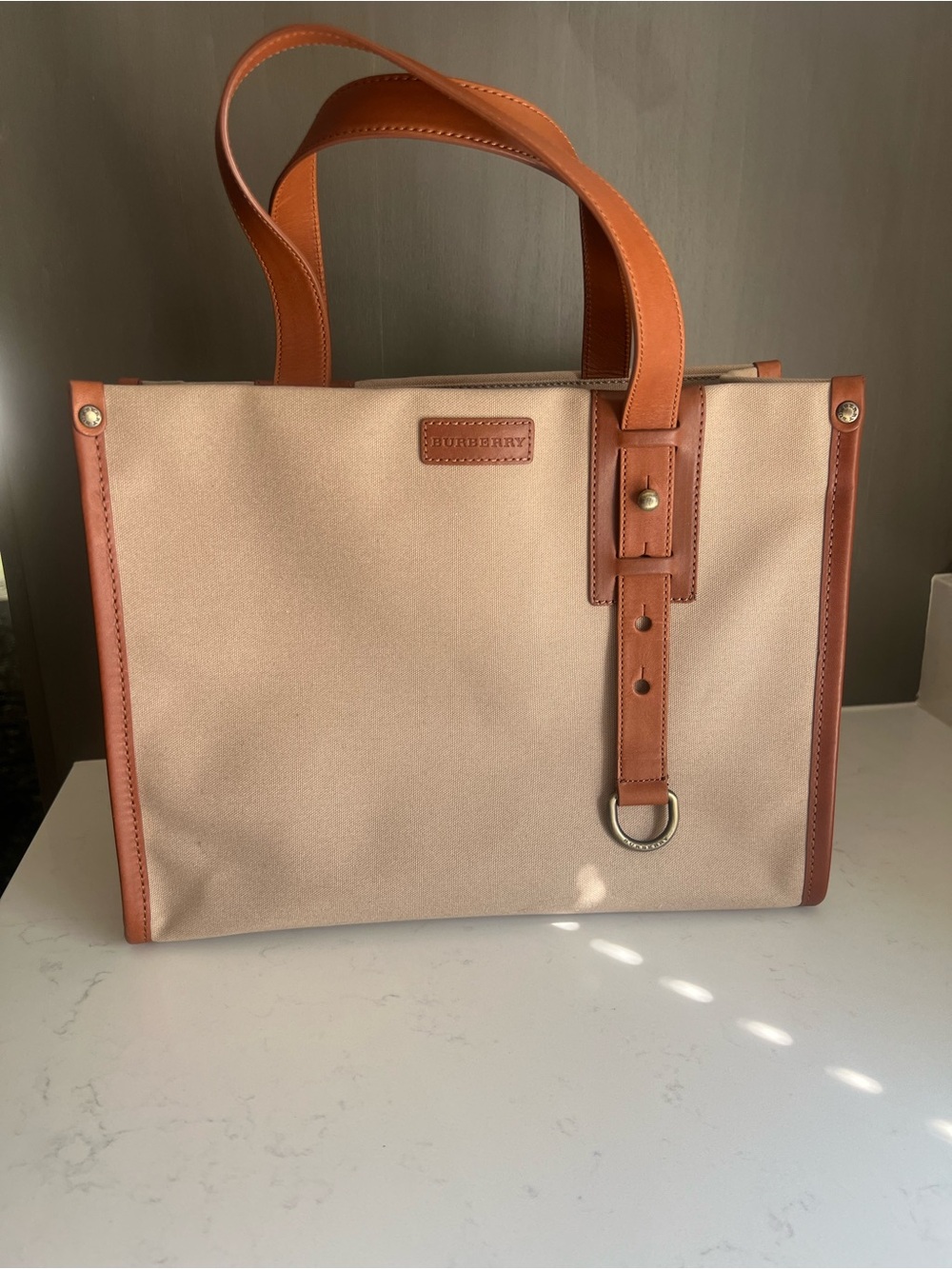 Burberry Beige Canvas Tote with Tan Leather Trim and D-Ring Accent